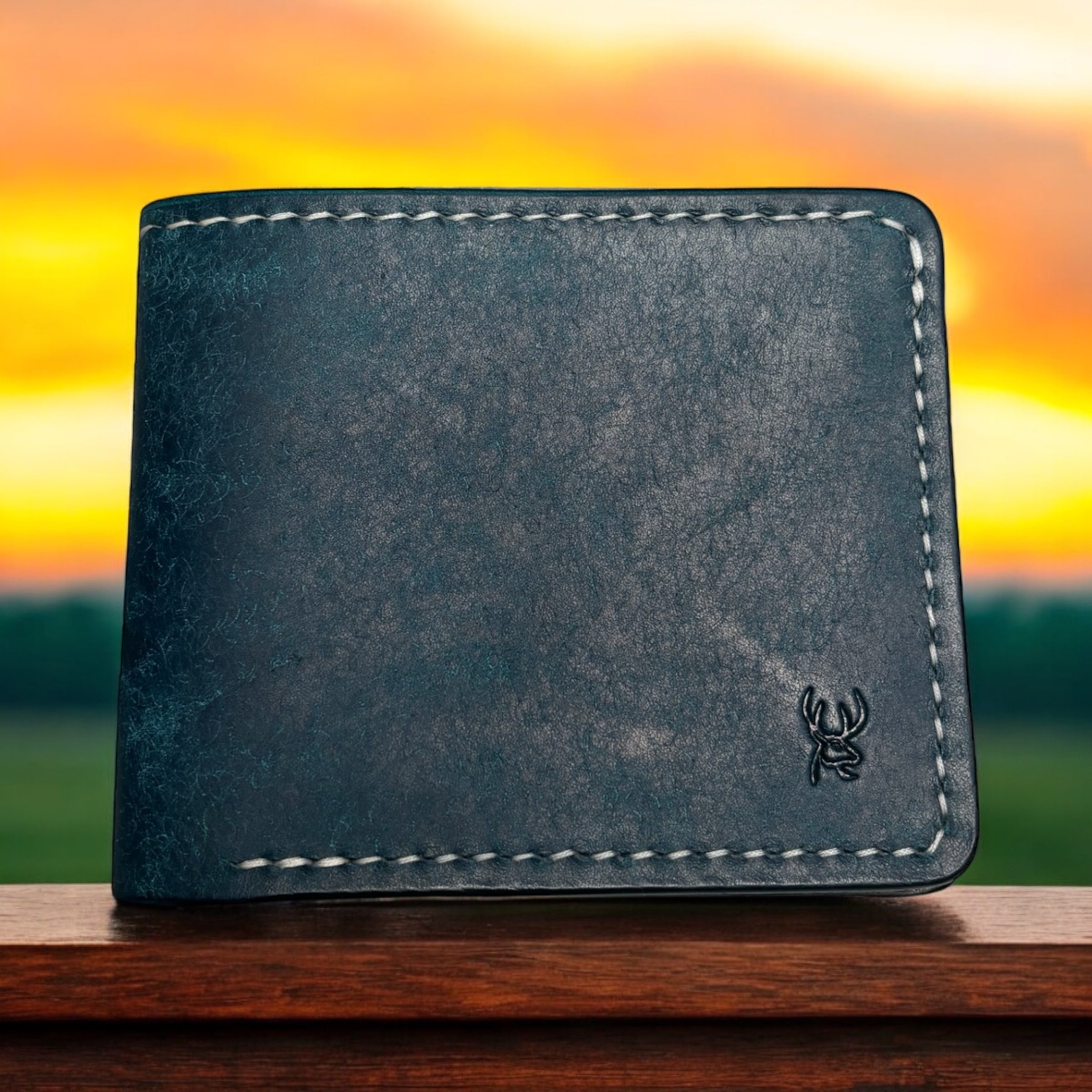 Bifold handmade horizontal leather wallet, made in Pueblo leather in black, handstitched in black thread. high quality The Manitoba.